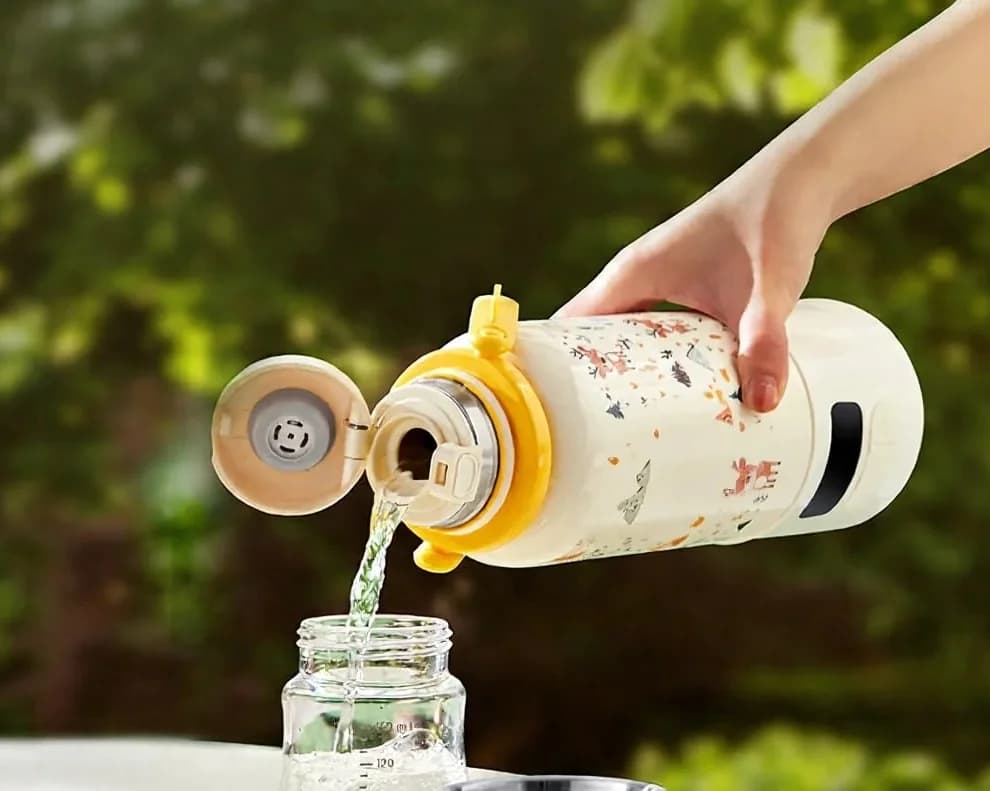 Tazza elettrica portatile per riscaldare l'acqua con bollitura a 100°C e termostato