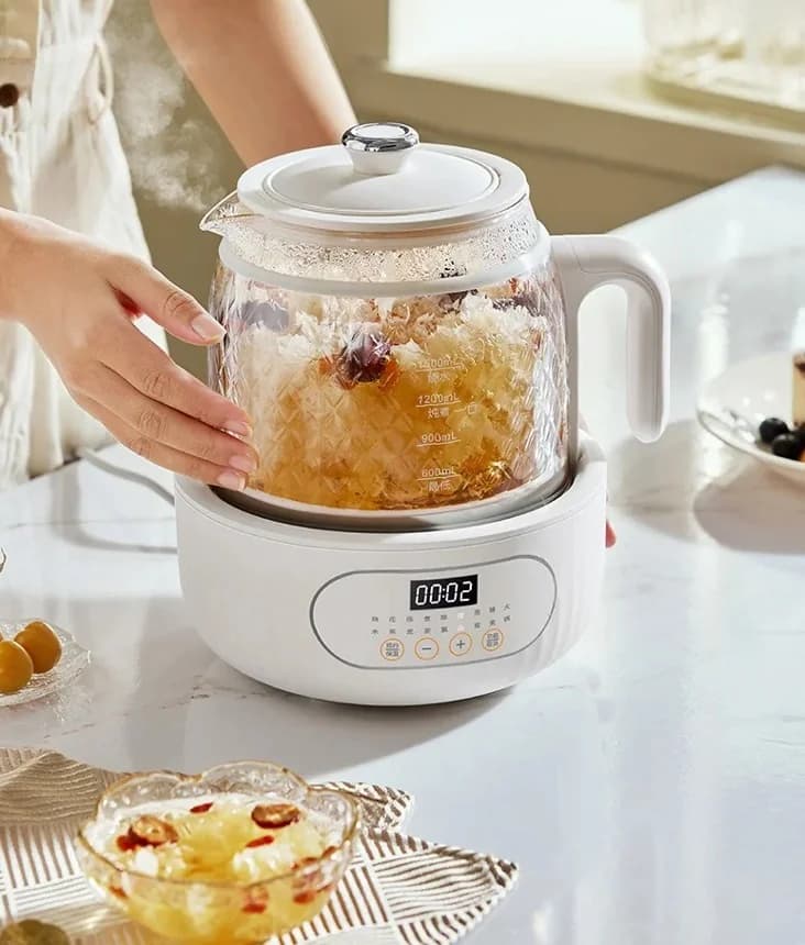 Pentola elettrica in vetro con termostato e preparazione del tè